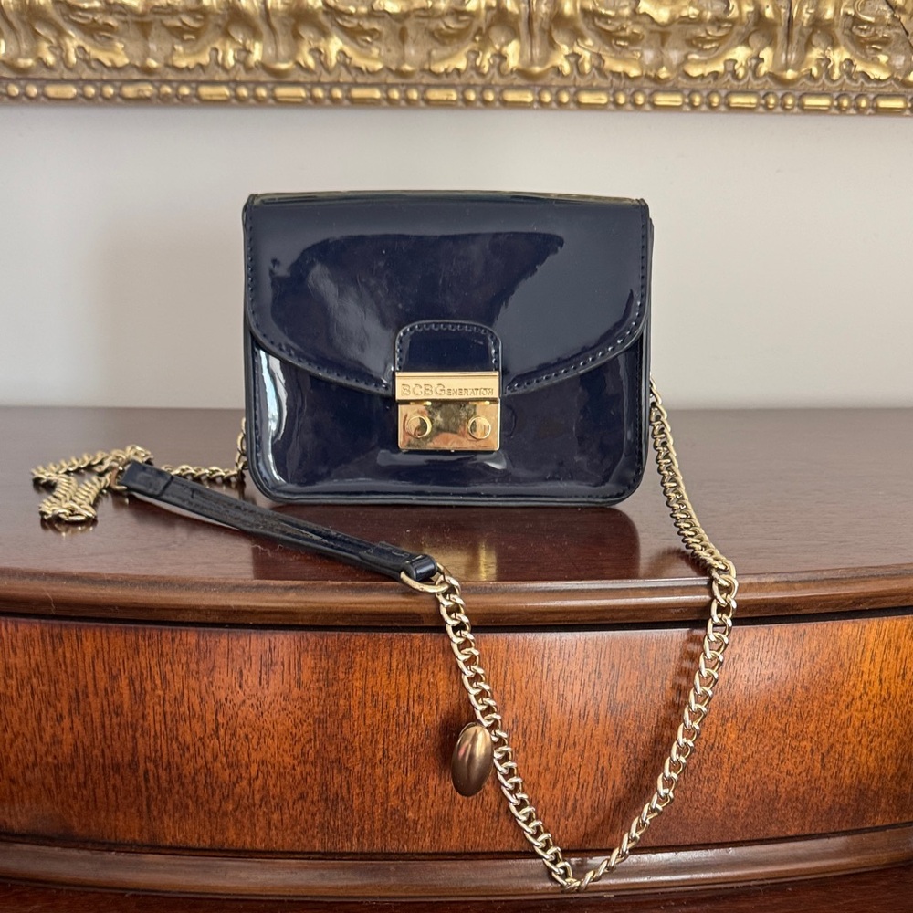 BCBGeneration blue patten leather purse.  Clean interior zipper pocket.